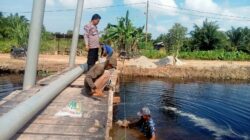 Jembatan Merah Putih Presisi: Bakti Polres Rokan Hilir Membuka Jalan Mimpi Siswa SDN 025 Bagan Hulu