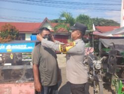 Polsek Bagan Sinembah Bagikan Masker kepada Masyarakat, Cegah Gangguan Pernapasan